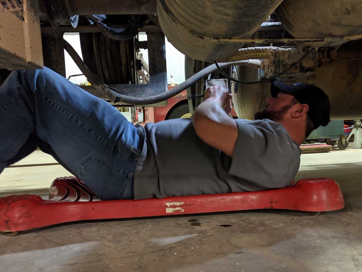 Jeff McQueen working on a diesel truck